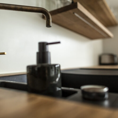 residence-black-kitchen-sink-brass-tap-designwolf