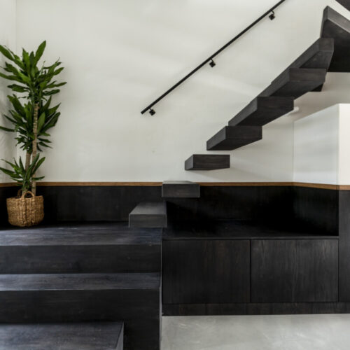 residence-wall-cabinet-turns-into-stairs-designwolf